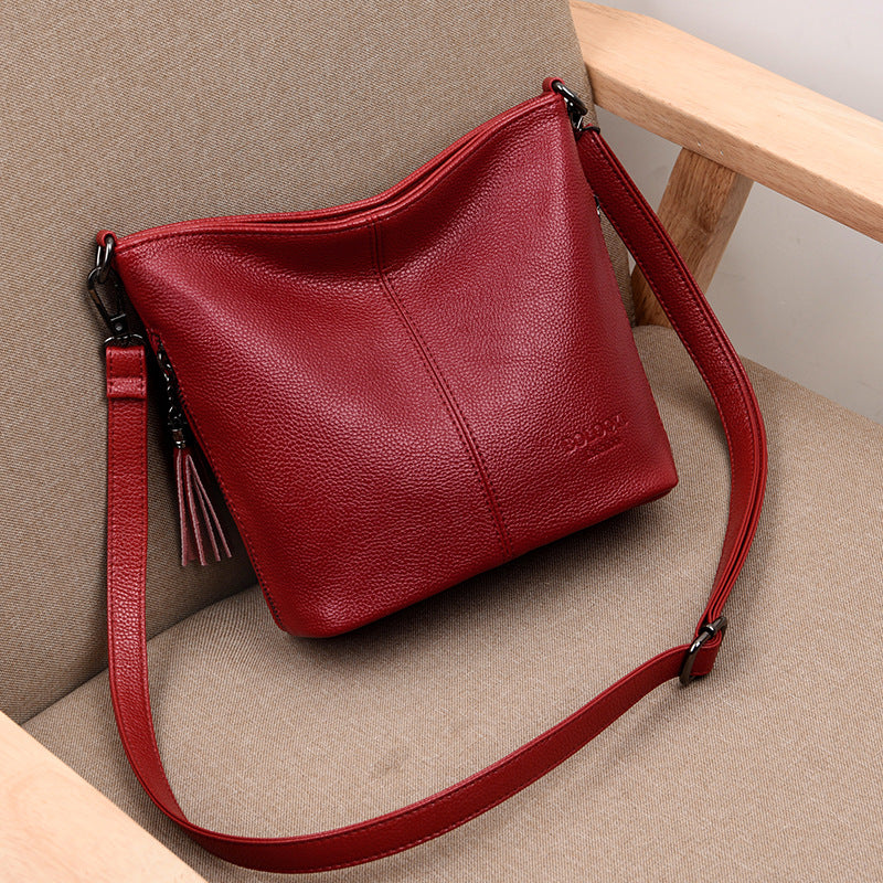Black Pebbled Leather Crossbody Bag with Tassel | Hobo Shoulder Bag