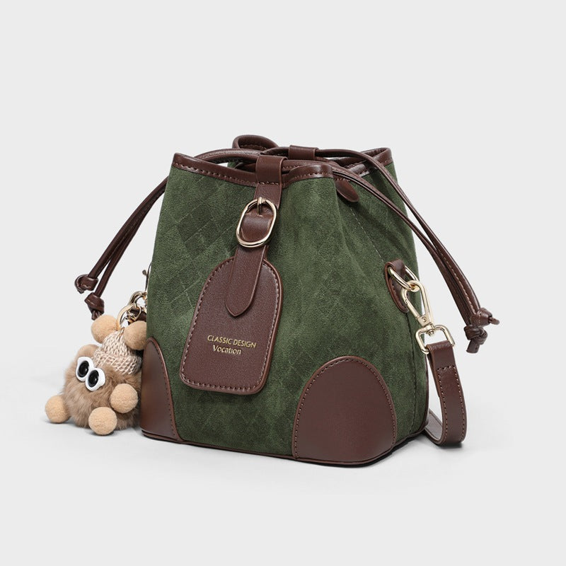 Green Suede Bucket Bag with Brown Leather Trim & Bear Charm | Classic Design Vocation Crossbody