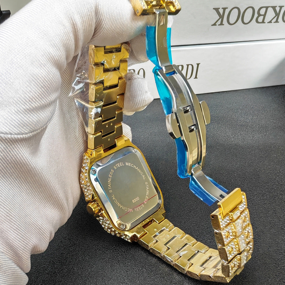 Iced Out Gold Square Watch | Full Diamond Crystal Baguette Bracelet Watch with Colorful Roman Numerals & Date Display | Hip Hop Luxury Watch