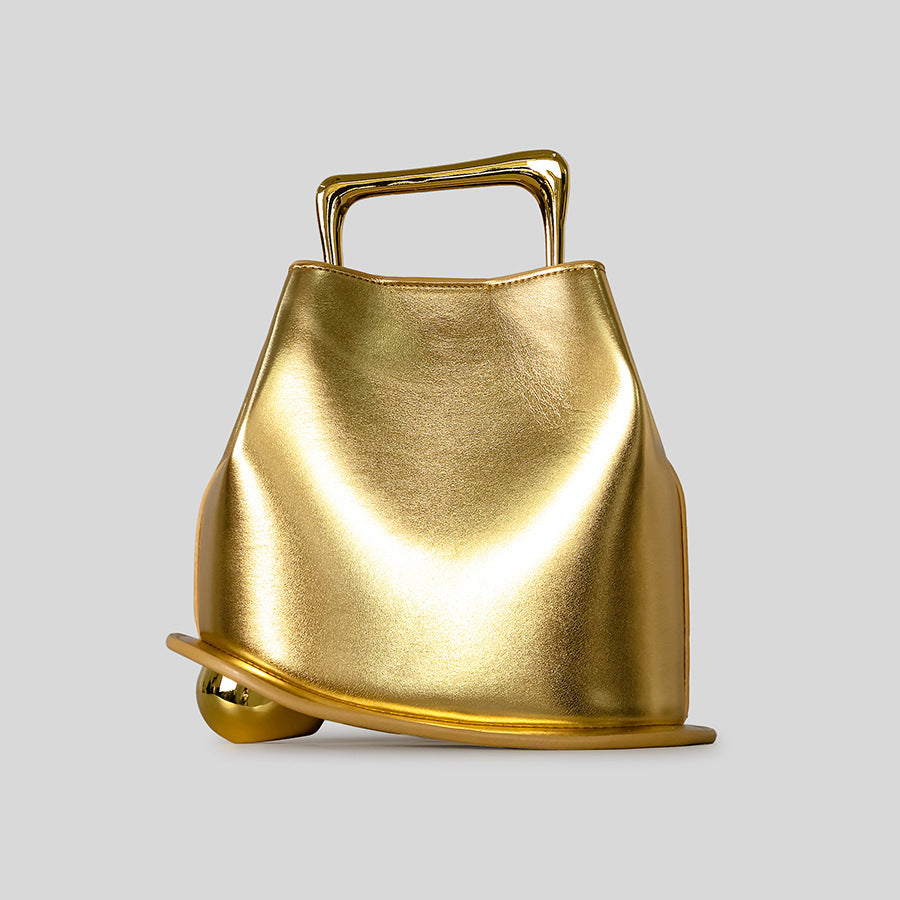 Black Leather Bag with Gold Metal Handle | Modern Bucket Bag Statement Piece