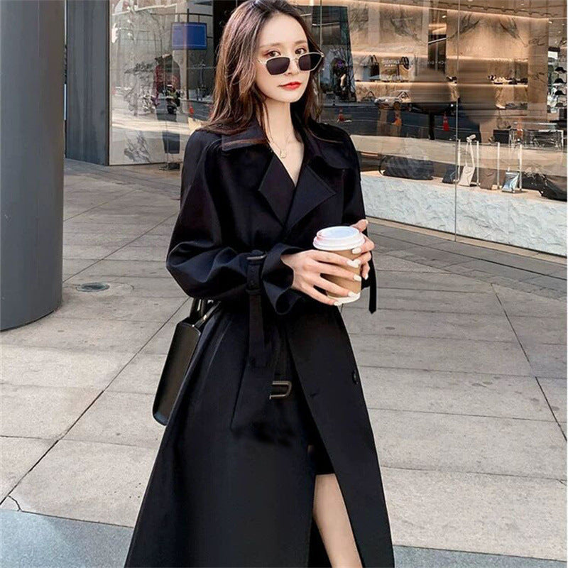 Women's Black Long Trench Coat with Belt, Double Breasted Lapel Collar and Midi Length for Fall and Winter