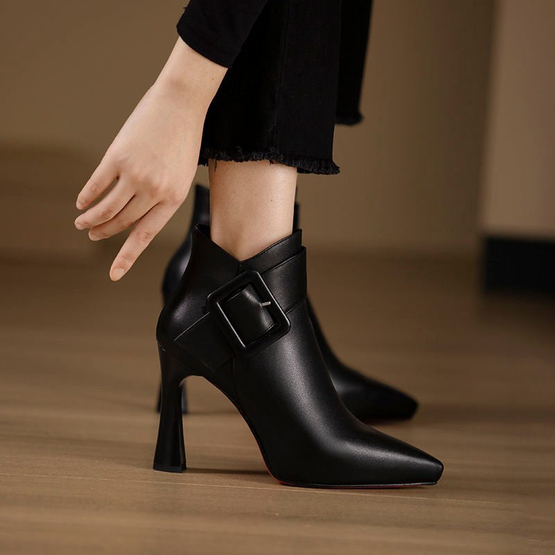 Black Leather Pointed Toe Stiletto Ankle Boots with Oversized Square Buckle Strap & Sculptural Flared Heel | Luxury Women's Boots