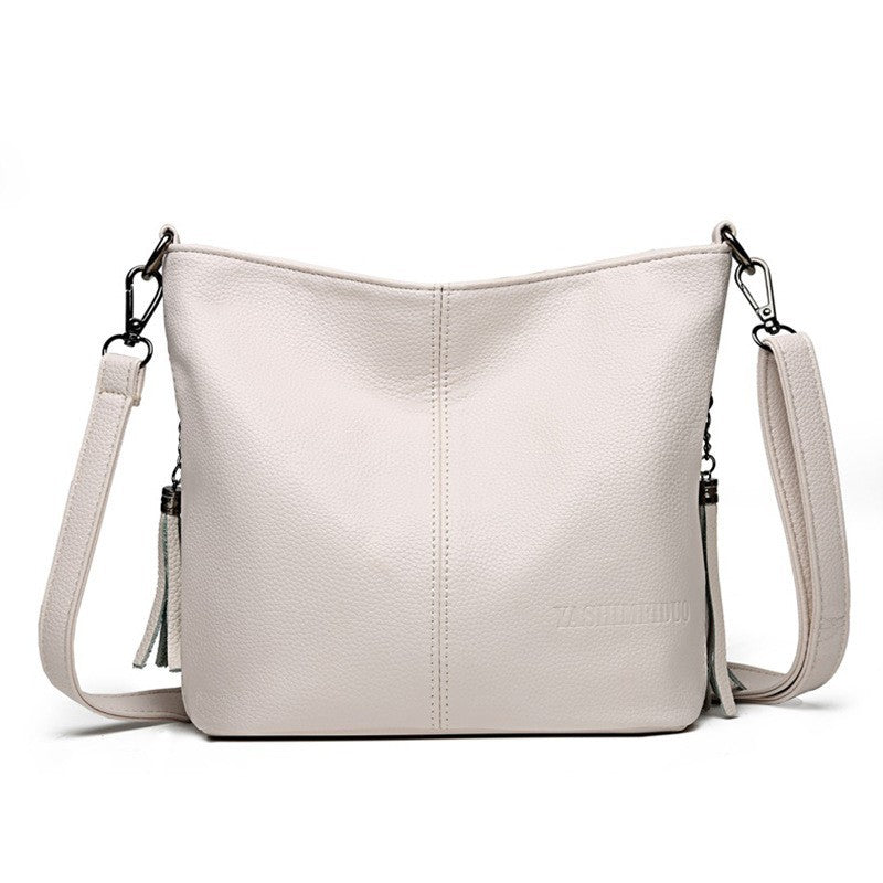 Black Pebbled Leather Crossbody Bag with Tassel | Hobo Shoulder Bag