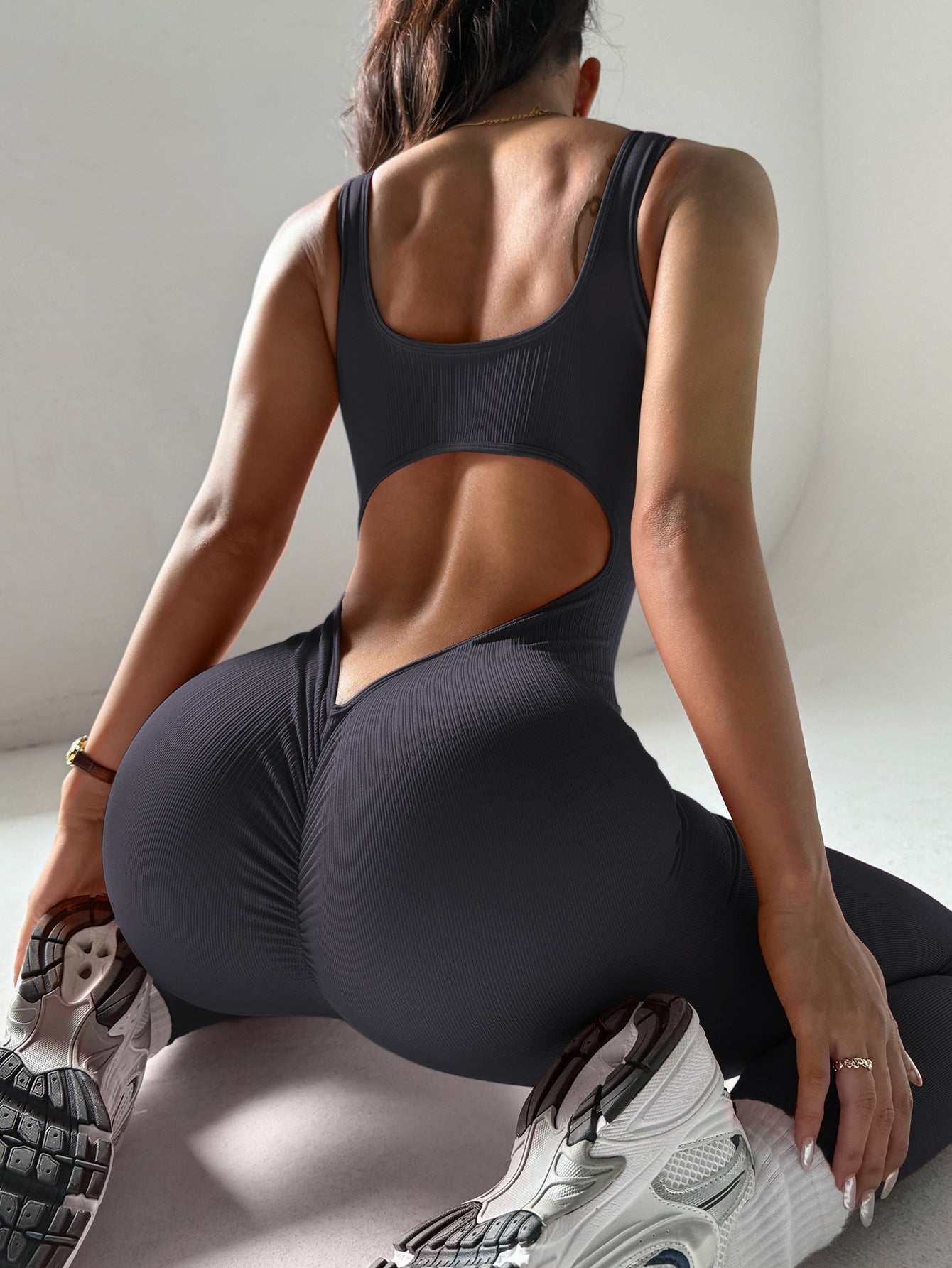 Tuta atletica nera senza cuciture | Unitard a collo a U senza maniche aderente | Tuta intera da donna per allenamento in palestra