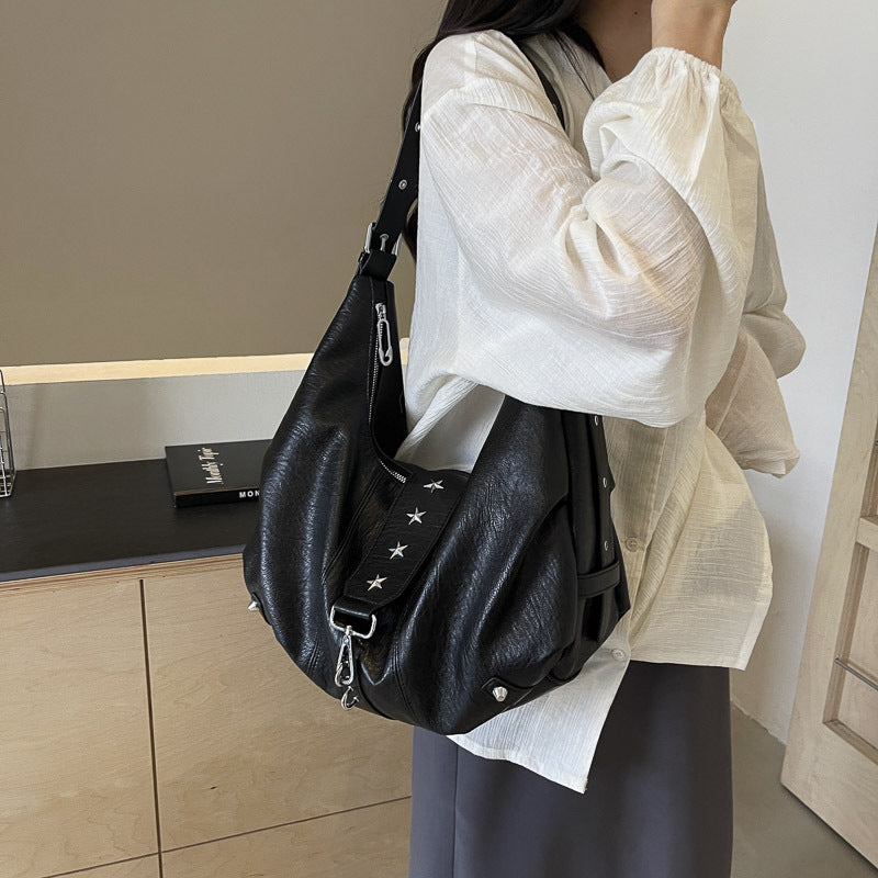 Black Leather Hobo Bag with Star Studs | Slouchy Shoulder Bag with Zip Detail