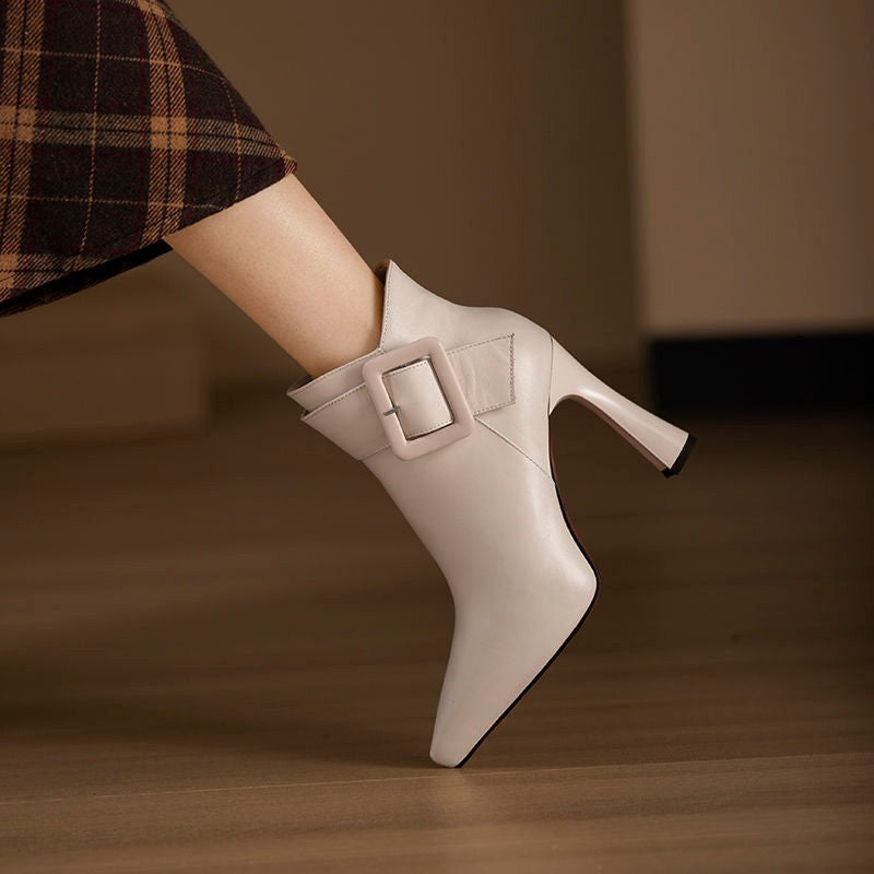 Black Leather Pointed Toe Stiletto Ankle Boots with Oversized Square Buckle Strap & Sculptural Flared Heel | Luxury Women's Boots