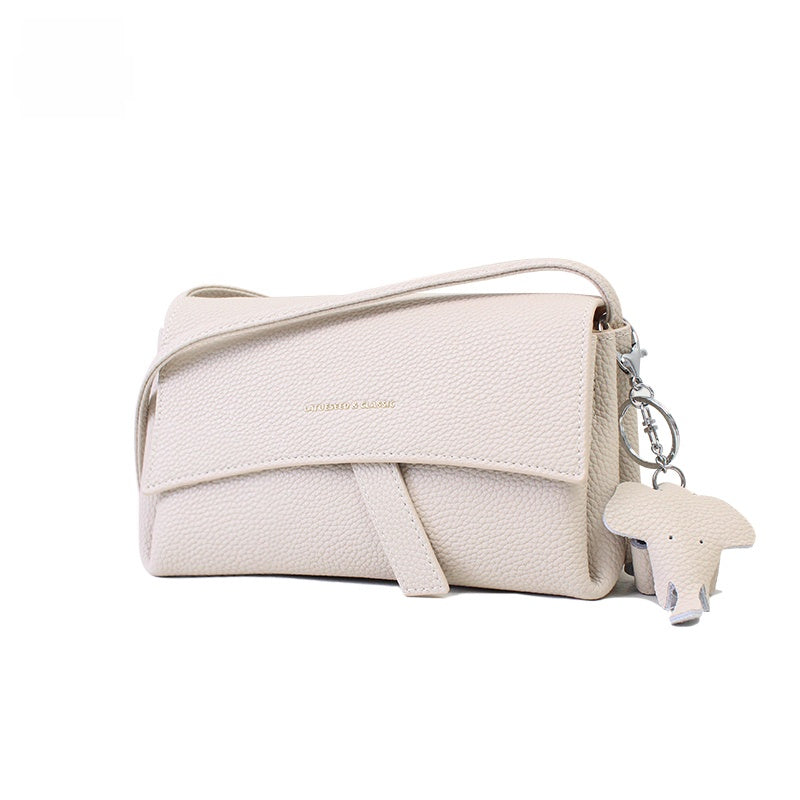 Beige Pebbled Leather Crossbody Bag - Soft Slouchy Shoulder Bag with Dog Charm | Minimalist Wide Strap Purse