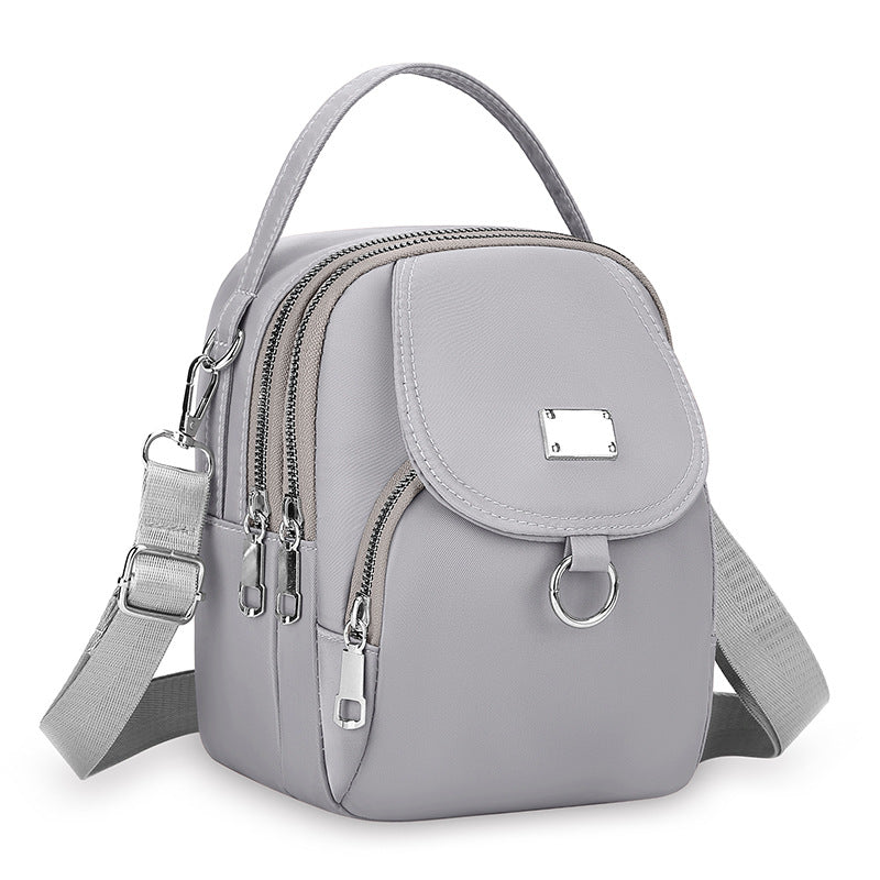Black Nylon Mini Backpack - Convertible Crossbody Bag with Multiple Compartments | Lightweight Travel Bag with Silver Hardware