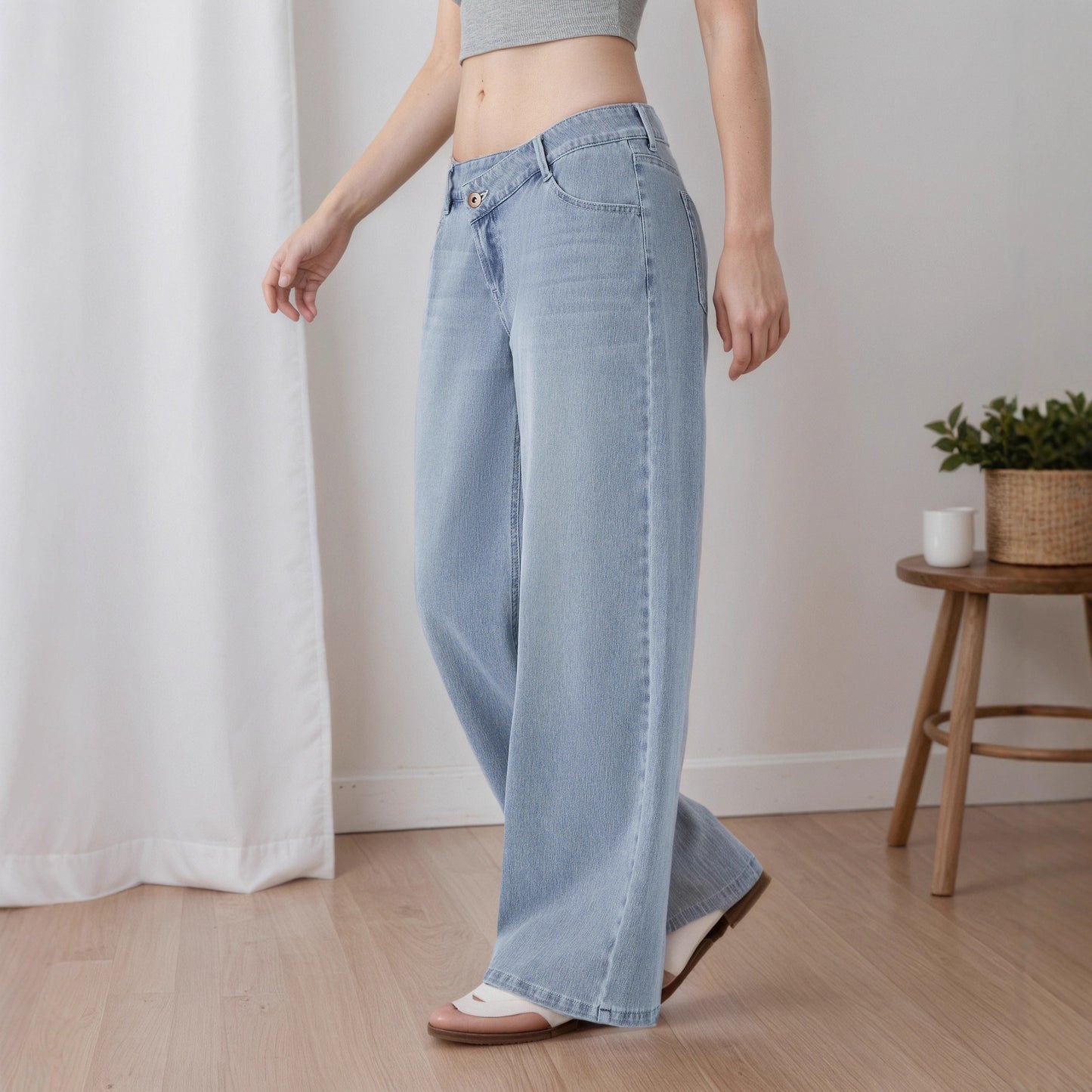 Jeans larghi a vita bassa da donna lavaggio chiaro | Pantaloni di jeans ampi con vita a V