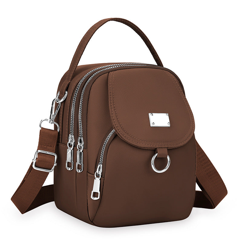 Black Nylon Mini Backpack - Convertible Crossbody Bag with Multiple Compartments | Lightweight Travel Bag with Silver Hardware