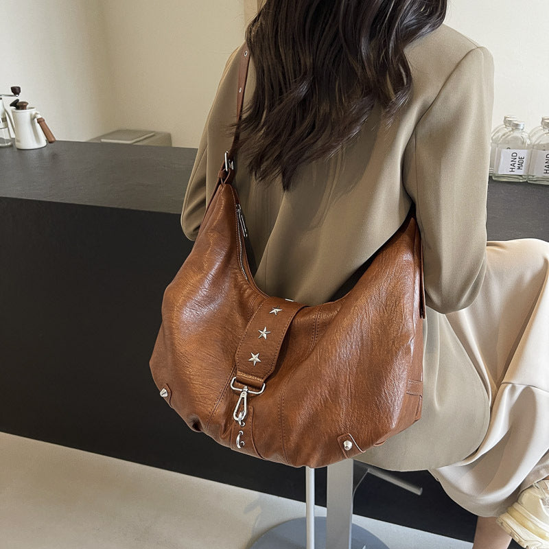 Black Leather Hobo Bag with Star Studs | Slouchy Shoulder Bag with Zip Detail
