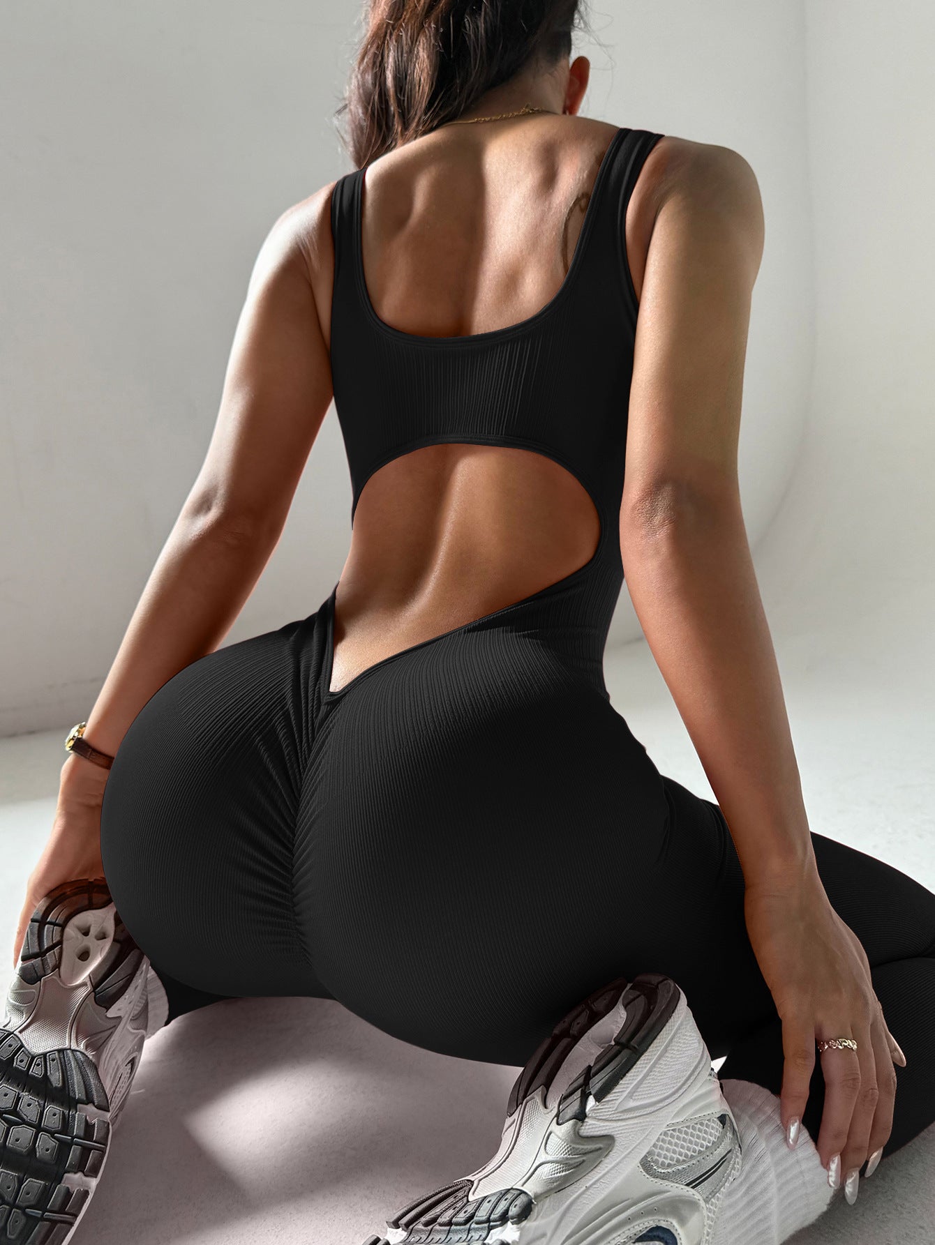 Tuta atletica nera senza cuciture | Unitard a collo a U senza maniche aderente | Tuta intera da donna per allenamento in palestra
