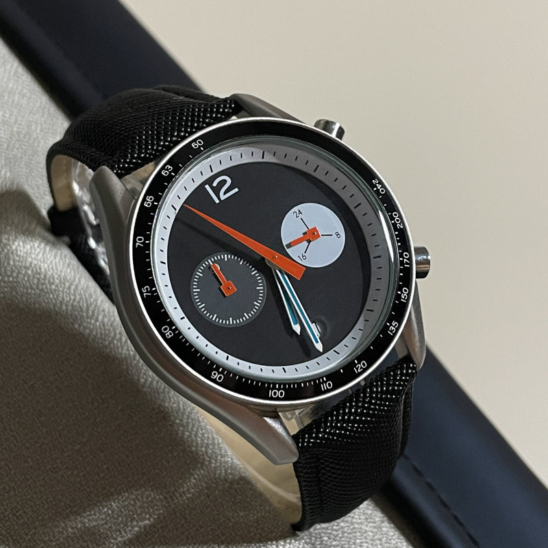 Hochleistungs-Leuchtchronograph für Herren | Sportuhr mit orange-türkisfarbenen Leuchtzeigern und Canvas-Armband 