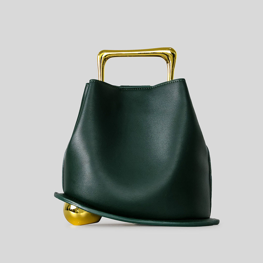 Black Leather Bag with Gold Metal Handle | Modern Bucket Bag Statement Piece