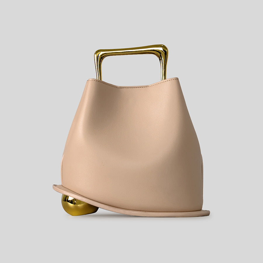 Black Leather Bag with Gold Metal Handle | Modern Bucket Bag Statement Piece