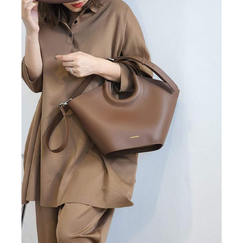 Cowhide High-End French Fashion Commuter Special Bag Niche Design Vegetable Basket Bag Brown Structured Tote Bag with Cutout Handle | Modern Trapezoid Leather Bag