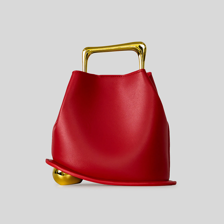 Black Leather Bag with Gold Metal Handle | Modern Bucket Bag Statement Piece