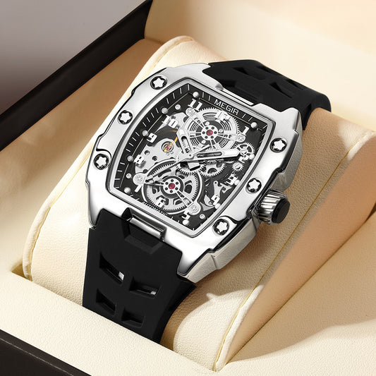 MEGIR Men's Automatic Skeleton Watch - Tonneau Case Silver Stainless Steel with Black Silicone Strap - Transparent Mechanical Movement Dial - Luxury Sport Dress Watch for Men