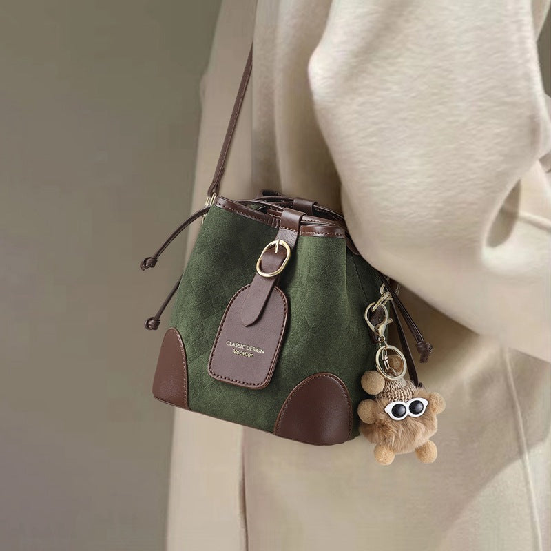 Green Suede Bucket Bag with Brown Leather Trim & Bear Charm | Classic Design Vocation Crossbody