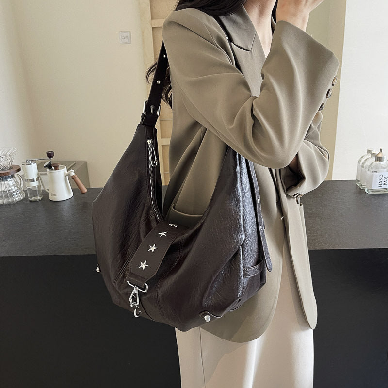 Black Leather Hobo Bag with Star Studs | Slouchy Shoulder Bag with Zip Detail