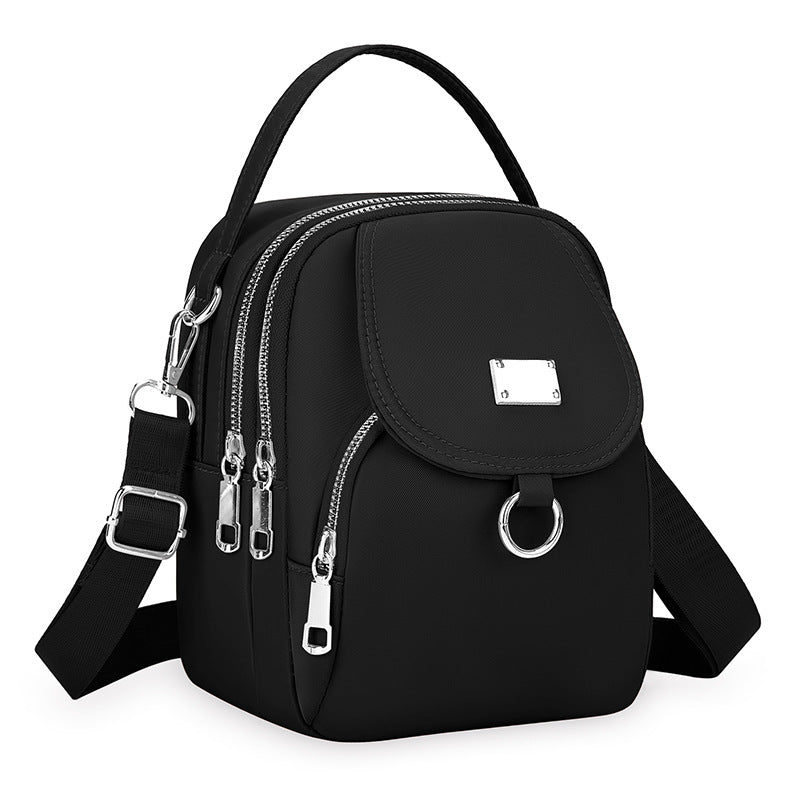 Black Nylon Mini Backpack - Convertible Crossbody Bag with Multiple Compartments | Lightweight Travel Bag with Silver Hardware