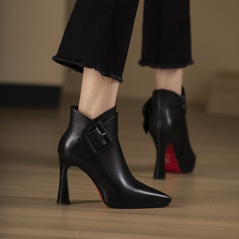 Black Leather Pointed Toe Stiletto Ankle Boots with Oversized Square Buckle Strap & Sculptural Flared Heel | Luxury Women's Boots