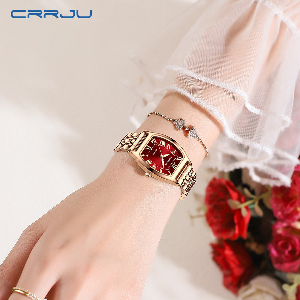ساعة CRRJU النسائية بلون الذهب الوردي بتصميم برميل | ساعة كوارتز فاخرة بأرقام رومانية حمراء 