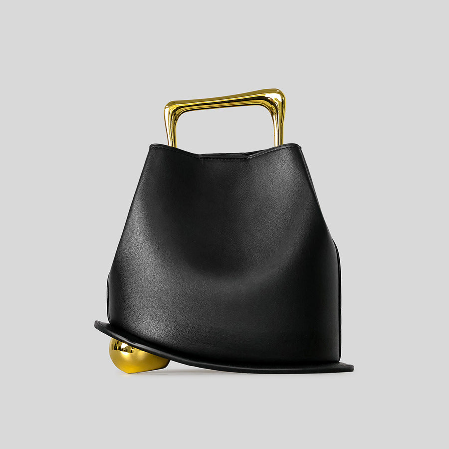 Black Leather Bag with Gold Metal Handle | Modern Bucket Bag Statement Piece