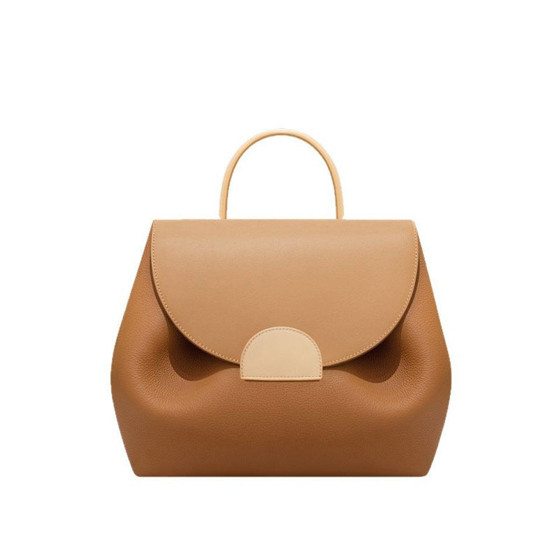 Polene Black Leather Structured Handbag with Curved Flap | Modern Top Handle Bag