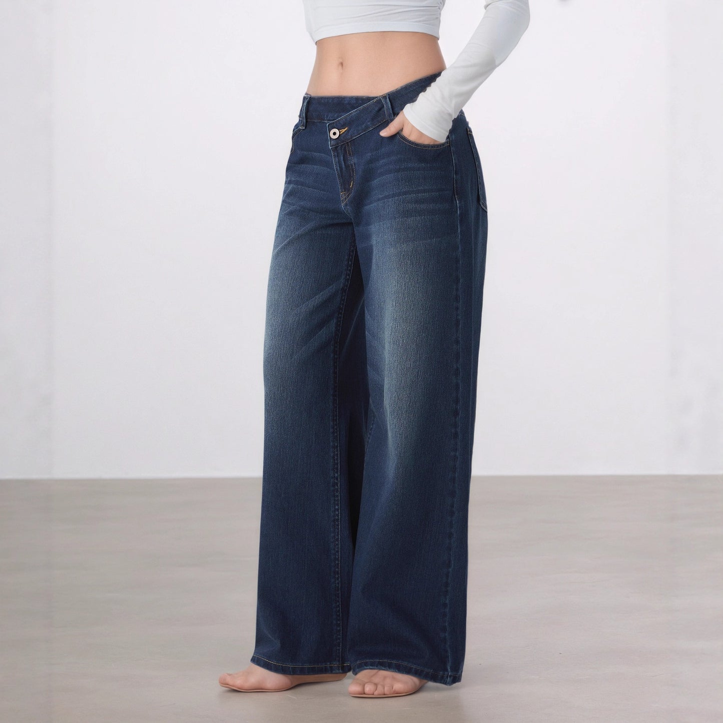 Jeans larghi a vita bassa da donna lavaggio chiaro | Pantaloni di jeans ampi con vita a V